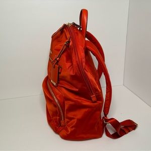 Tumi backpack, orange